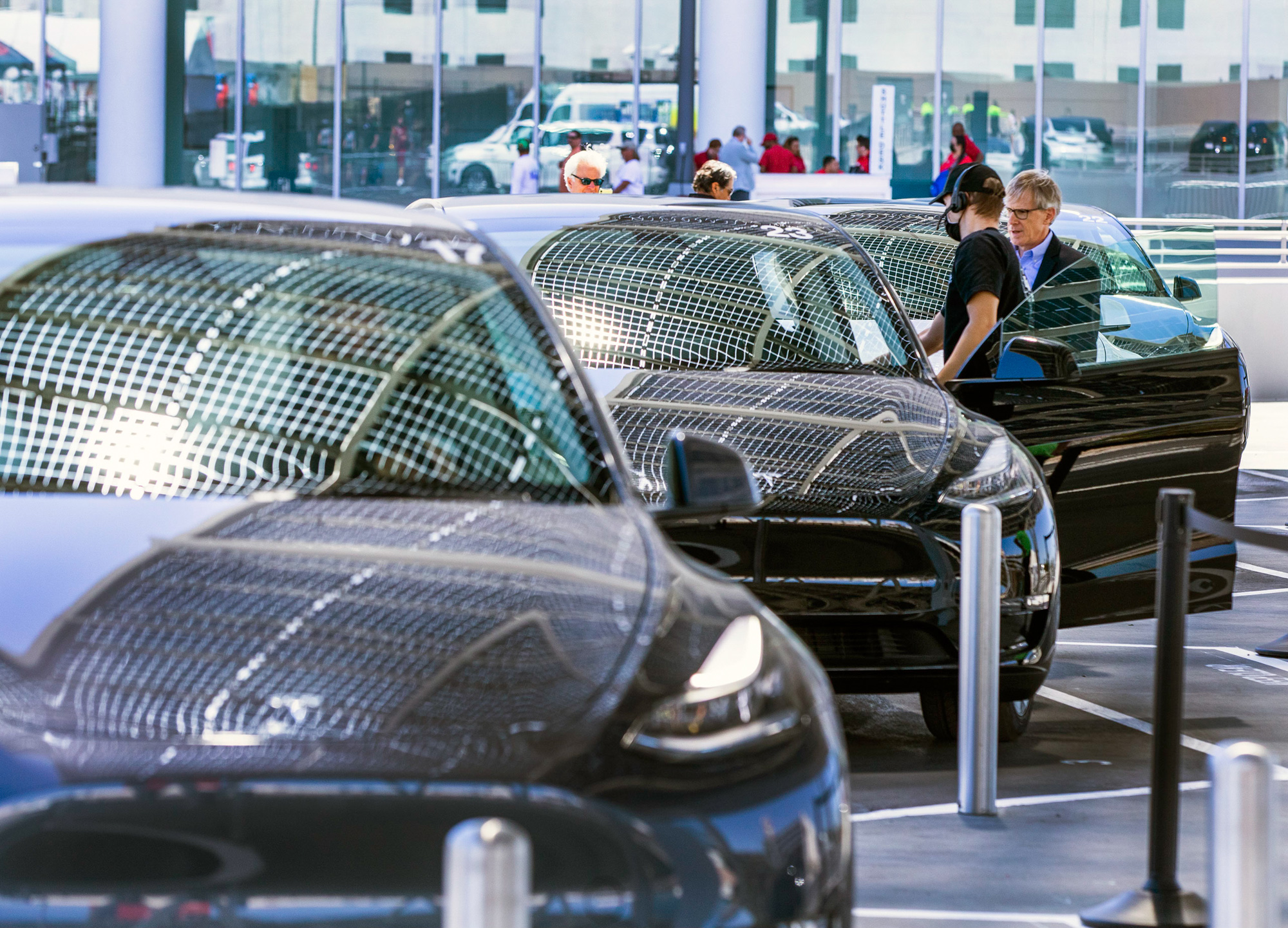 Solar panels reflect off Tesla vehicles during the World of Concrete trade show at the Las Vegas Convention Center.